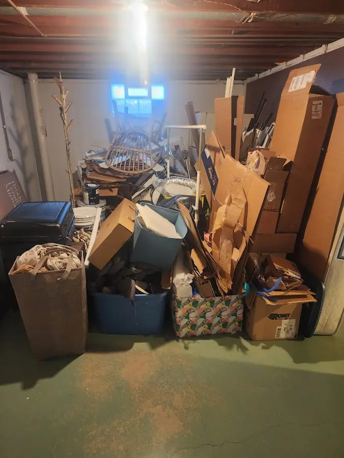 Roll-off dumpster container at job site for Cleanout Dumpster Rental in Dix